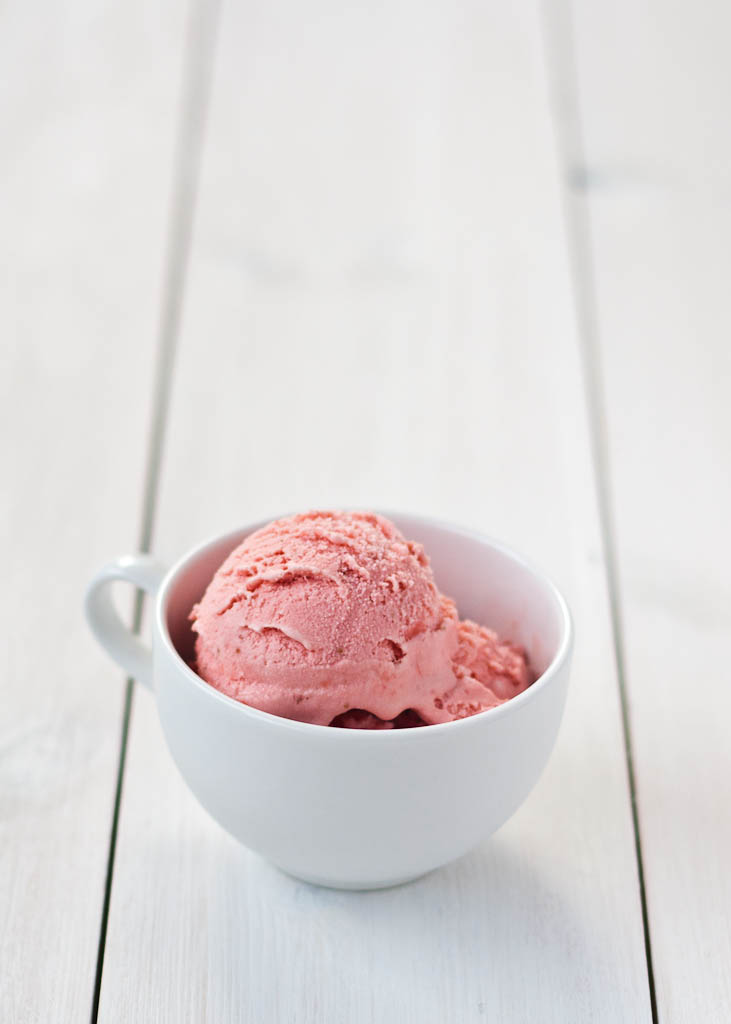strawberry ice cream in a white cup