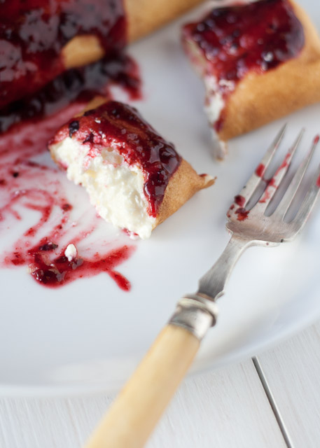 sweet cheese crepes with fruit syrup